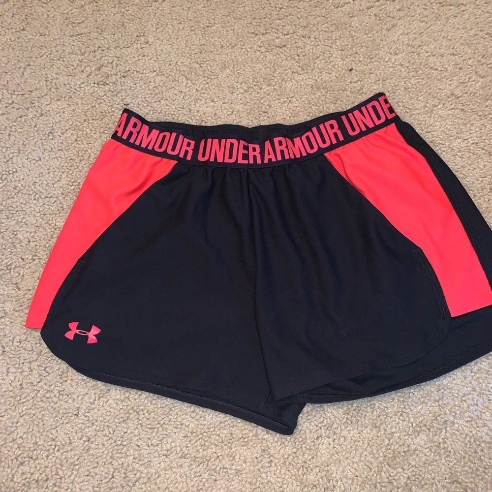Under armor shorts with pockets, neon pink and black.